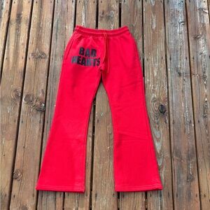 Vibrant Red Joggers with Graphic Design